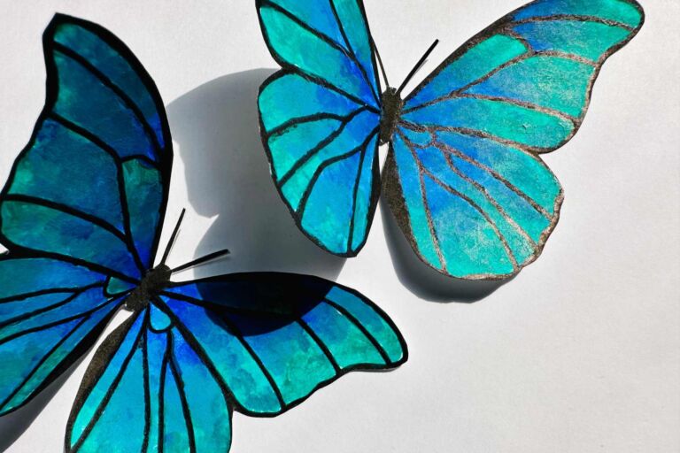 Small blue butterflies cut out