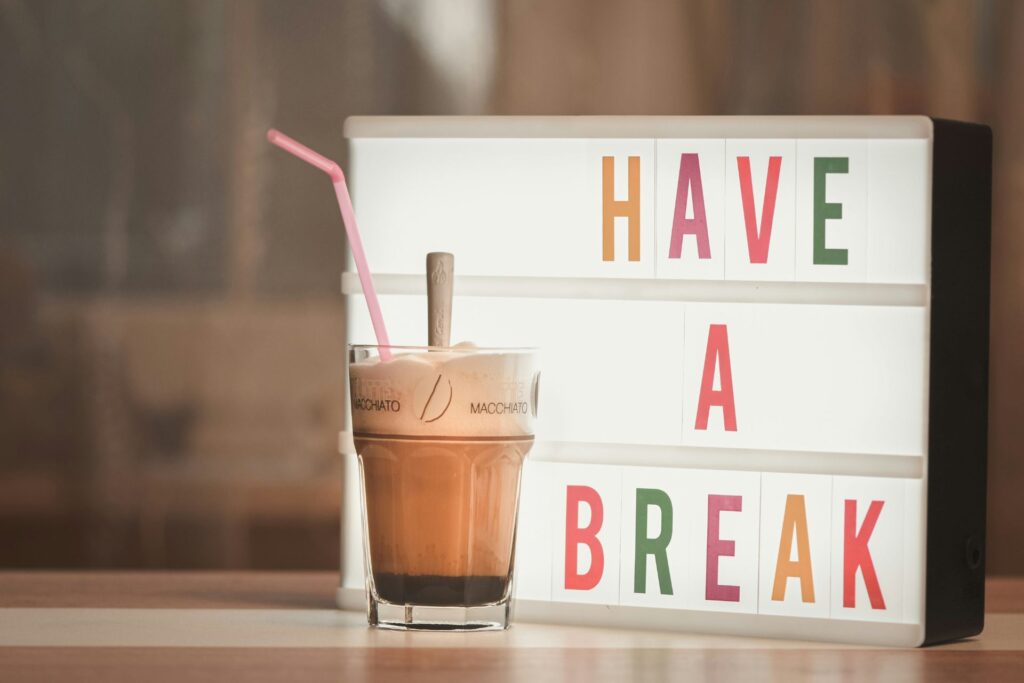 Delicious drink with have a break sign